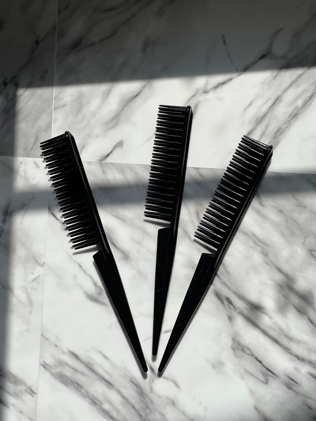 Three-row curl defining brush