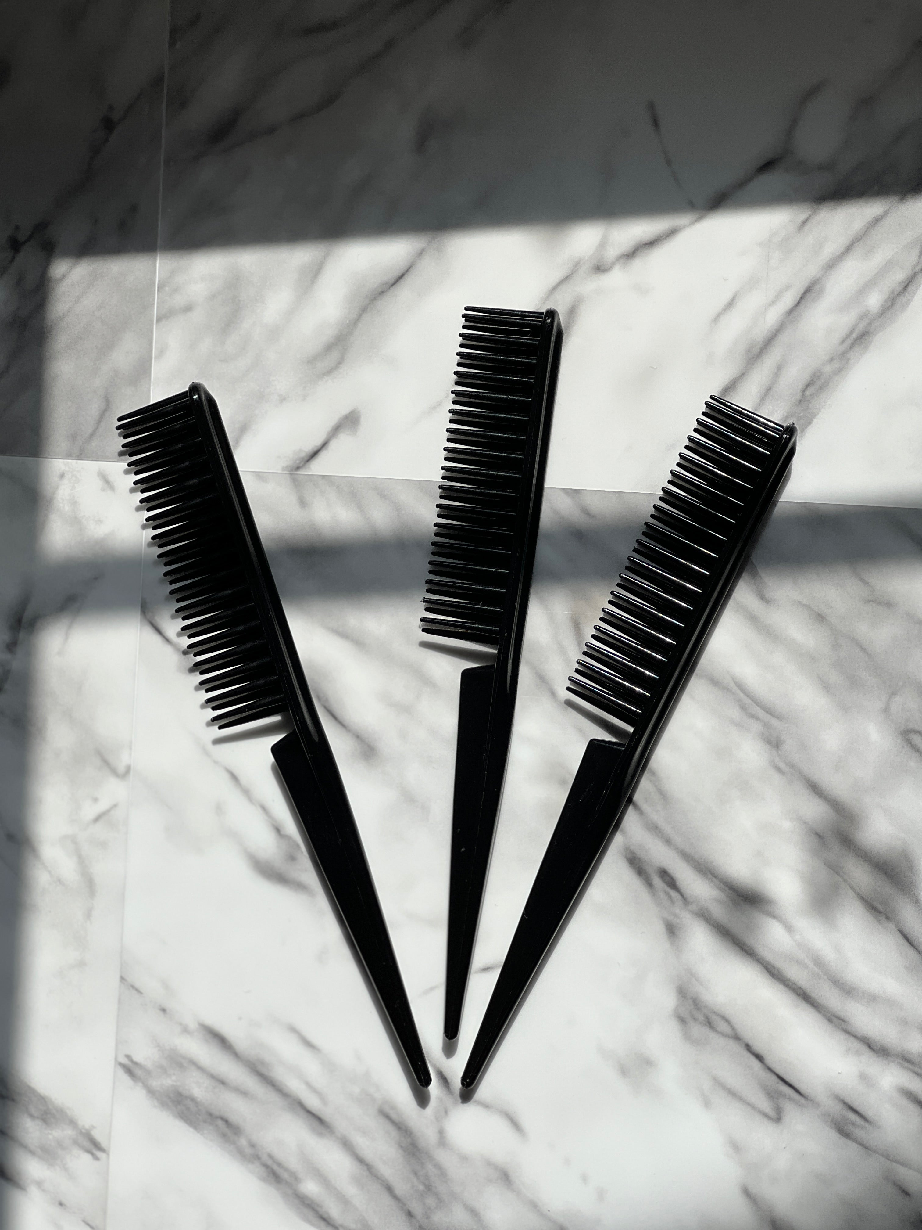 Three-row curl defining brush