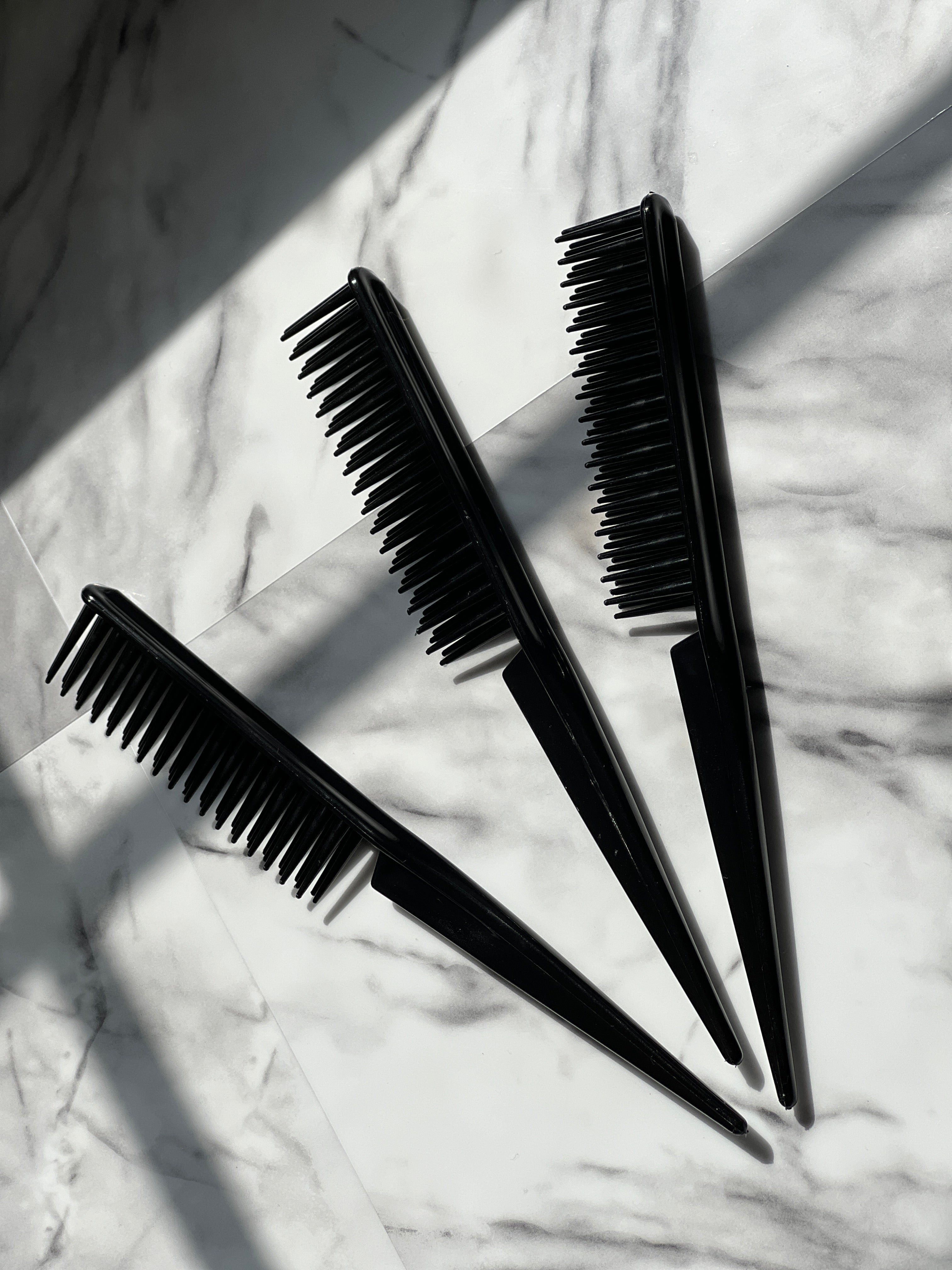 Three-row curl defining brush