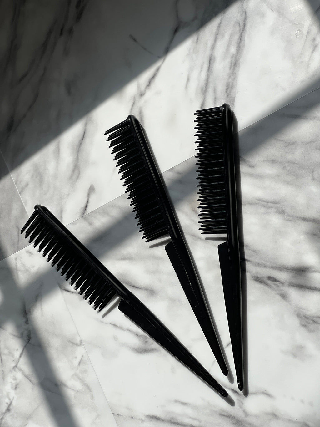 Three-row curl defining brush